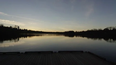 Lake Dock Sunset Locked-Off 4K Stock Footage 72125885