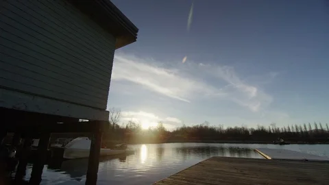 Lake Dock Sunset Locked-Off 4K Stock Footage 72125889