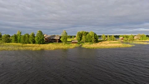 Lake with dramatic clouds and forest. Stock-Footage 342387768