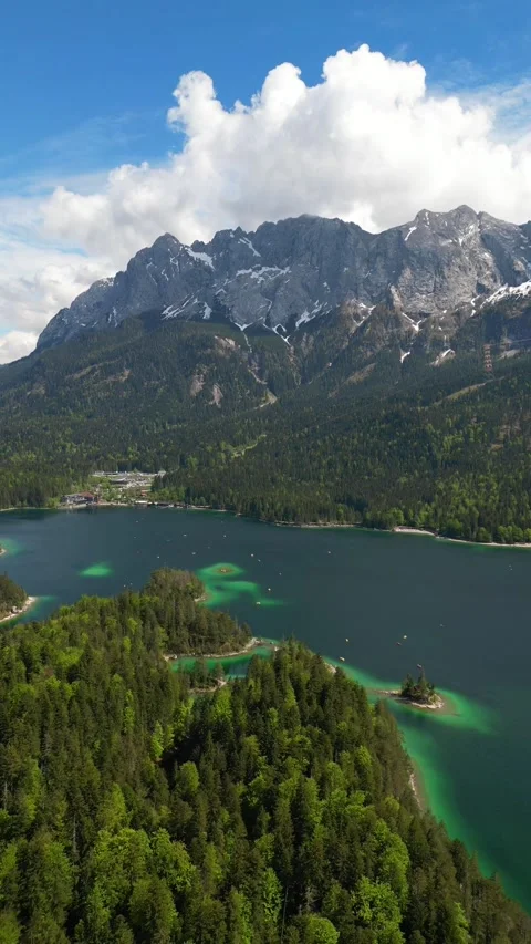 Lake Eibsee aerial drone Germany Bavaria nature vertical video Zugspitze Stock Footage 324772180