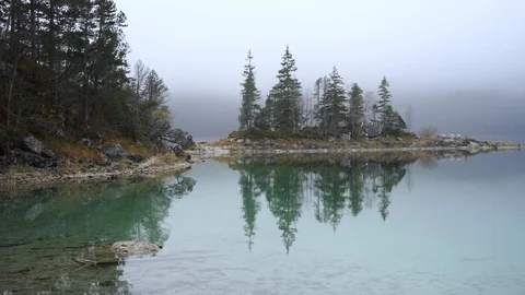 Lake Eibsee bavaria germany with reflecting trees Stock-Footage 120189934
