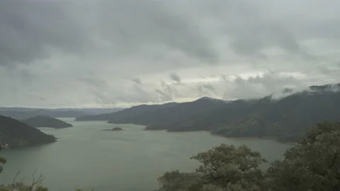 Lake Eildon After the Storm in 4K Timelapse Clouds Building From the Forest Stock Footage 147475310