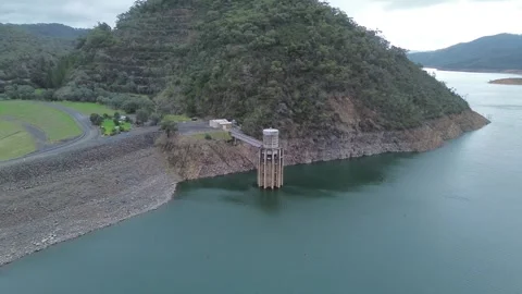Lake eildon dam wall and water intake tower Stock Footage 334906843