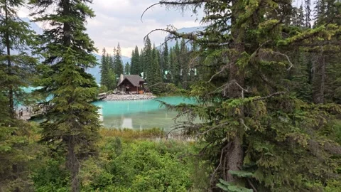 Lake Emerald with canoes in Canada Yoho National Park Stock Footage 346733407