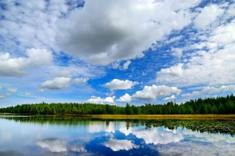 Lake Engozero and dramatic clouds. North Karelia, Russia Stock Photos