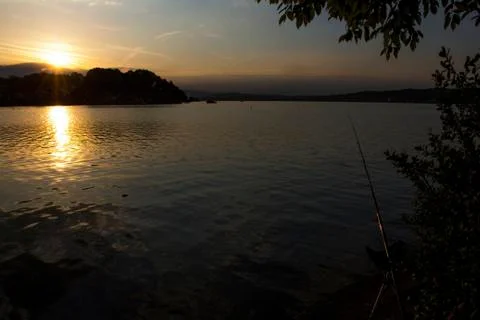 Lake in evening Stock Photos