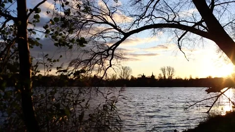 Lake in evening sun clouds Stock Footage 144388348