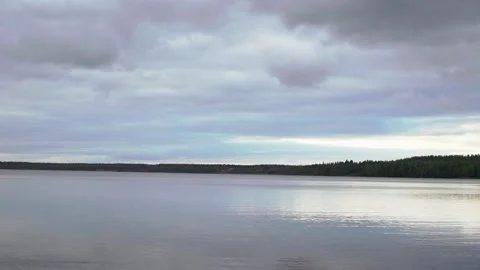 Lake in the evening at sunset. Water surface, forest pond. Stock Footage 164239823