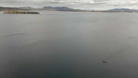 Lake fall forest aerial drone high angle tilt down Stock Footage 169446757