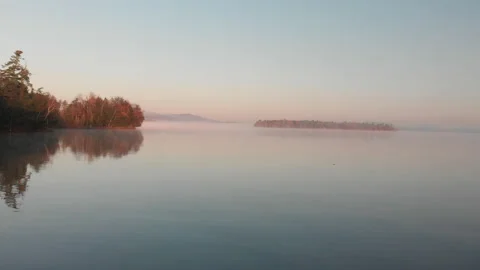 Lake fall forest aerial tracking shot wide Stock Footage 169207371