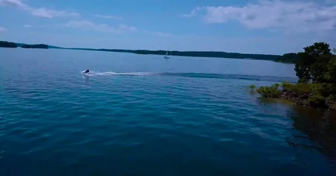 Lake flyover--toward the Mavic Stock Footage 78152671