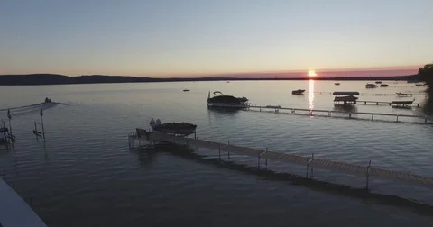 Lake Flyover Towards Sunset Stock Footage 79375601