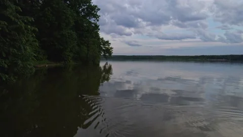 Lake in the forest with a drone Stock Footage 238502618