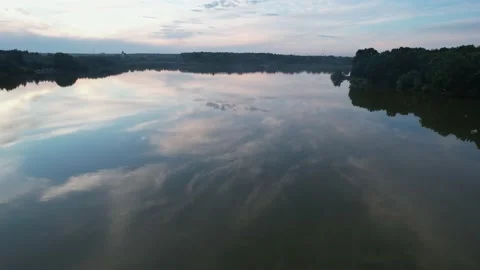 Lake in the forest with a drone Stock Footage 238502662