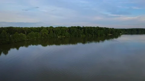 Lake in the forest with a drone Stock Footage 238502703