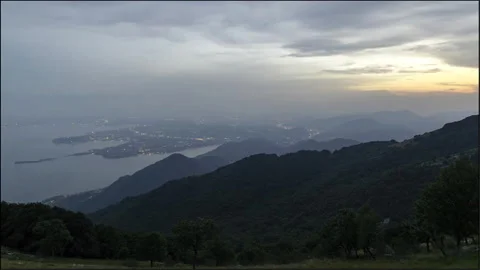 Lake Garda time lapse during sunset from day to night Stock Footage 137194615