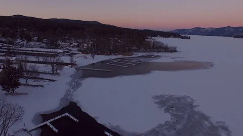 Lake George, NY winter sunset aerial 10 Stock Footage
