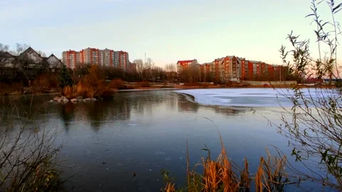 Lake half covered in ice with ducks Stock Footage 220501958