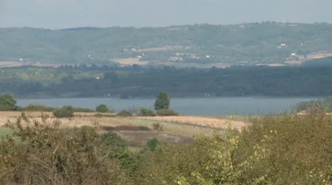Lake in hills Video stock 8853674