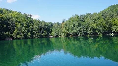 Lake with its reflection, lake with trees, blue lake, yedigoller Stock Footage 92853803