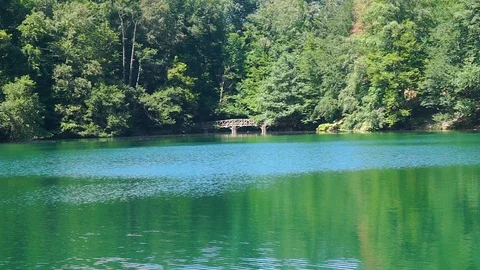 Lake with its reflection, lake with trees, blue lake, yedigoller Stock Footage 92853856