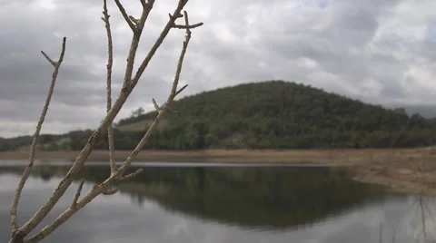 Lake with large hill in background Stock Footage 61505491