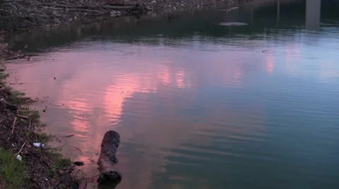 Lake with light Ripples - Red Cloud Reflection 1080/24p HD Stock Footage 25930026