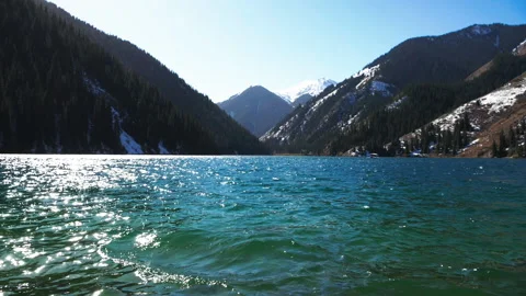 The lake is located high in the mountains Stock-Footage 163483908