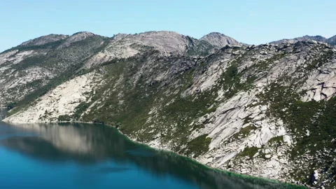 The lake is located high in the mountains Видео 232941108
