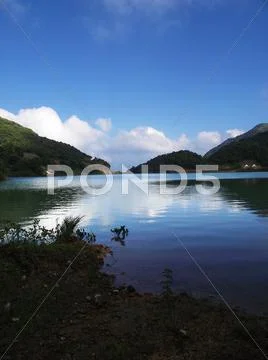 Lake locates at canyonside of nanling ridge Stock Photos