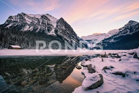 Lake Louise at Sunset in Winter, Banff National Park, Alberta, Canada Stock Photos