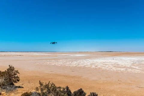 Lake Maclead drone hovering over arid salt lake in Western Australia mirage a Stock Photos