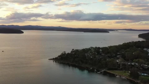 Lake Macquarie Murrays beach scenic lakeshore at sunset in aerial 4k. Stock Footage 248181655
