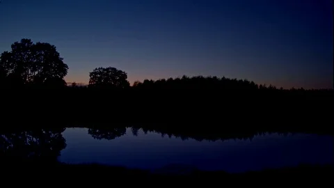 Lake, magic hour, handheld, medium shot 01/02 Stock Footage 82424096
