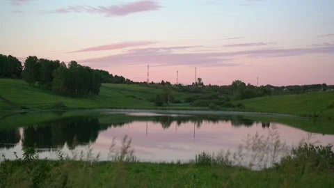 Lake in the Middle of Meadows and Forests 库存影片 133738701