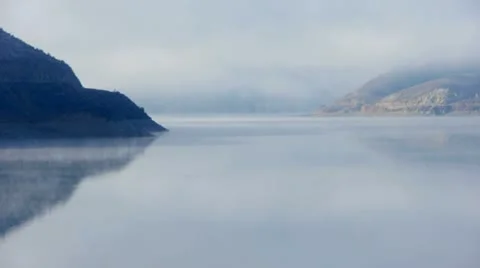 Lake in mist and clouds Stock Footage 22061257