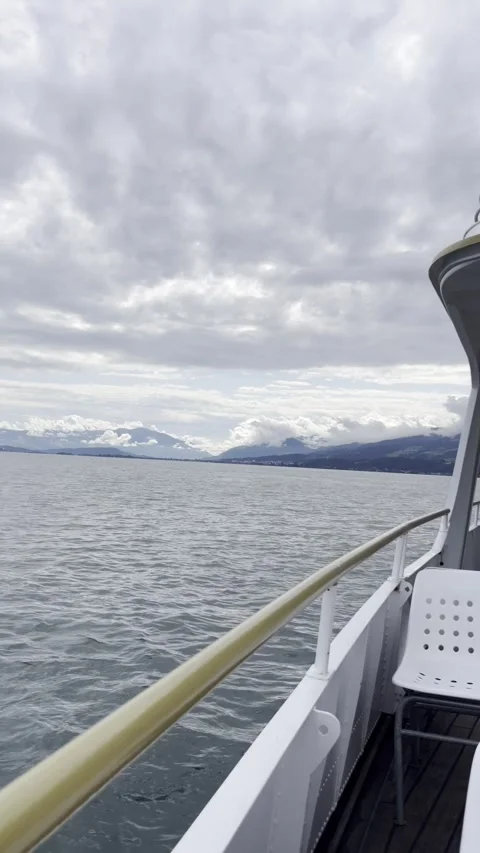 Lake, mountains and sky from sightseeing boat Stock Footage 306067778