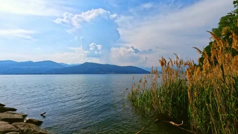 Lake in the mountains with beautiful clouds Stock Footage 242202583