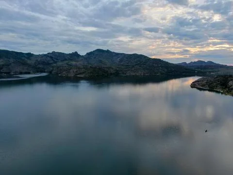 Lake in the mountains in the evening Stock Photos