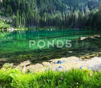 Lake in mountains Stock Photos