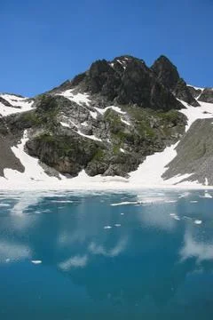 Lake in mountains Stock Photos