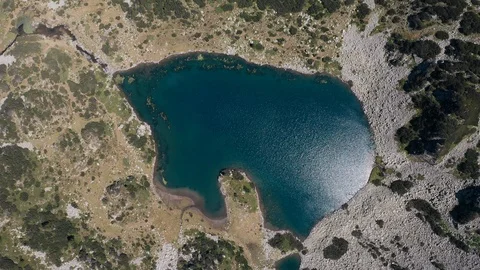 Lake in the mountains in shape of bear with blue clear water 스톡 동영상 123544648