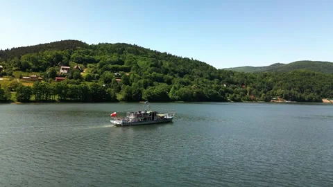 Lake in the mountains with a ship Stock Footage 243121253