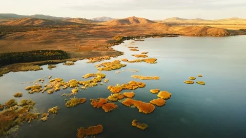 Lake in the mountains at sunset. Stock Footage 252142178