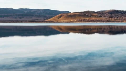 Lake in the mountains at sunset. Stock Footage 298182707