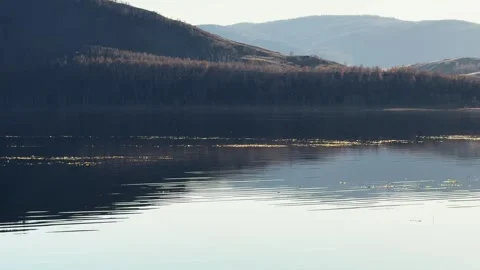 Lake in the mountains at sunset. Stock-Footage 298182757