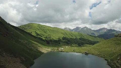 Lake in the mountains under the bright sun. Stock Footage 148656456