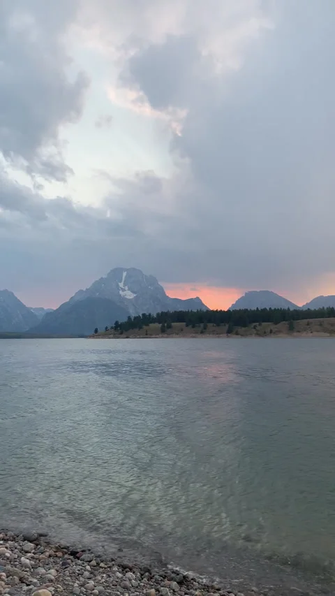 Lake Moutain Wispy Clouds Sunset Vertical HD Stock Footage 179520317
