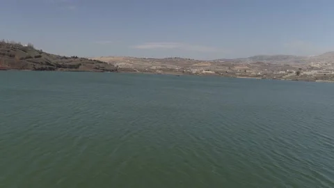 Lake Ram Hermon view aerial pan up Stock Footage 139738495