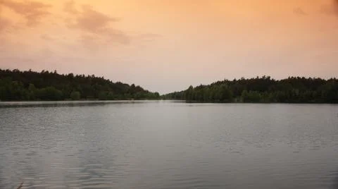 Lake with Red Cloud Stock Photos